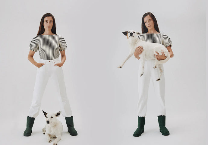 Two identical images of a woman in veagn boots holding a small white dog on a plain background