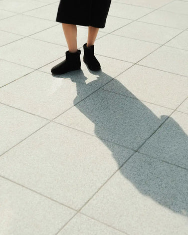 Black vegan mid-calf boots – ethical and cozy design