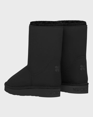 Black vegan boots with a brand logo on a light gray background