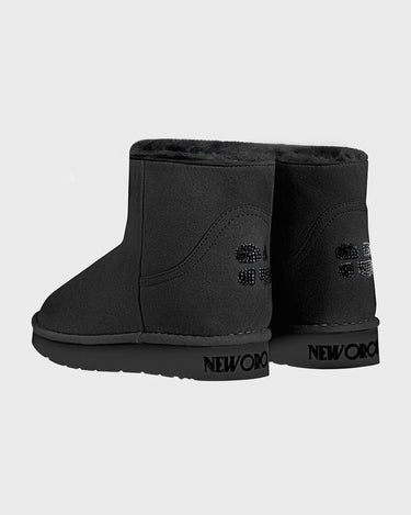 Black winter vegan boots with New Orchard logo on a light gray background