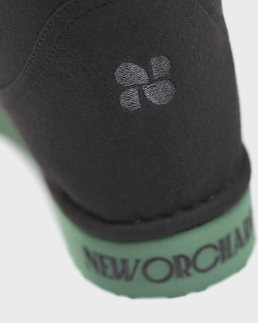 Ethical black winter boots with green sole – vegan style