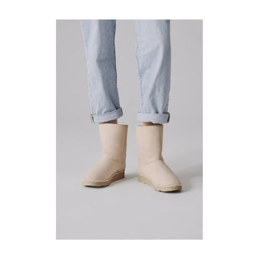 Ethical off-white mid-calf vegan boots with faux fur