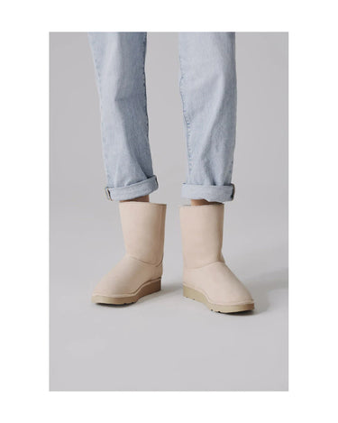 Ethical off-white mid-calf vegan boots with faux fur