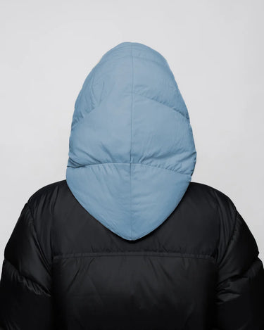 Sky blue vegan puffer capuche made from recycled materials, shown from the back. - The New Orchard - Sky Blue