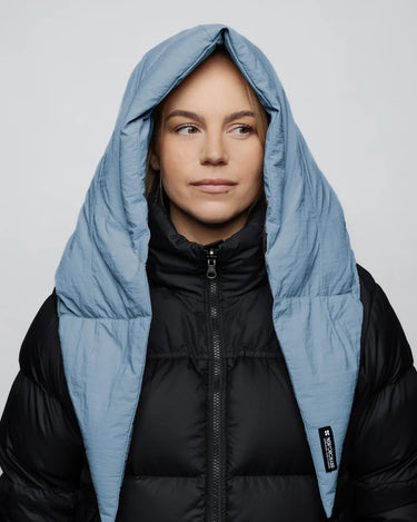 Sky blue vegan winter capuche made from recycled materials with quilted design on black puffer jacket. - The New Orchard - Sky Blue