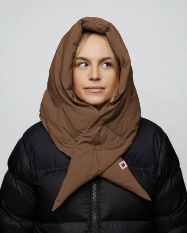 Warm brown vegan winter capuche made from recycled materials, styled over a black puffer jacket. - The New Orchard - Warm Brown