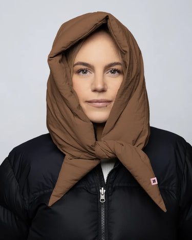 Warm brown vegan winter capuche made from recycled materials, styled over black jacket. - The New Orchard - Warm Brown