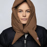 Warm brown vegan winter capuche made from recycled materials, styled over black jacket. - The New Orchard - Warm Brown