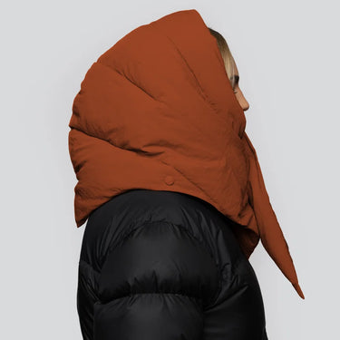 Vegan winter hood in fresh cinnamon color made from recycled materials, worn over black puffer jacket. - The New Orchard - Fresh Cinnamon