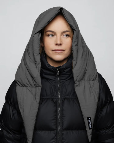Light grey vegan winter capuche made from recycled materials, worn over black puffer jacket. - The New Orchard - Light Grey