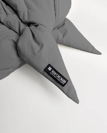 Light grey vegan winter capuche made from recycled materials with black woven label. - The New Orchard - Light Grey