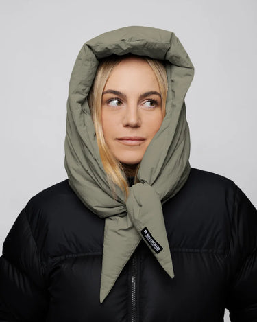 Khaki vegan winter capuche made from recycled materials, worn with black puffer jacket. - The New Orchard - Natural Khaki