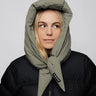 Khaki vegan winter capuche made from recycled materials, worn with black puffer jacket. - The New Orchard - Natural Khaki