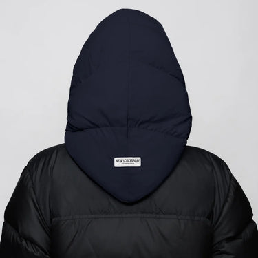 Navy blue vegan winter capuche made from recycled materials on black puffer jacket back view. - The New Orchard - ⁠Navy Blue