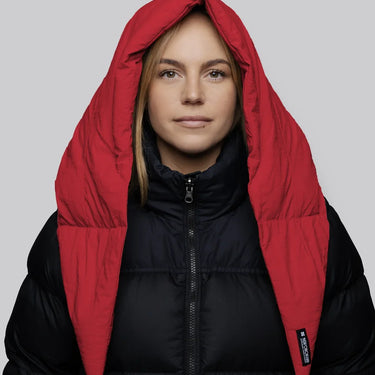 Vivid red winter vegan capuche made from recycled materials worn over black puffer jacket. - The New Orchard - Vivid Red