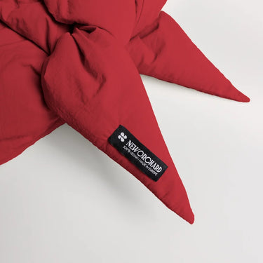 Vivid red vegan hood made from recycled materials with tied ends and black brand label. - The New Orchard - Vivid Red