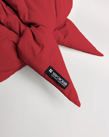 Vivid red vegan hood made from recycled materials with tied ends and black brand label. - The New Orchard - Vivid Red