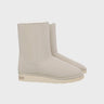 Off-white vegan mid-calf boots with faux fur lining