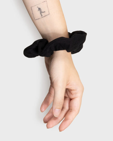Sustainable black scrunchie made from recycled materials