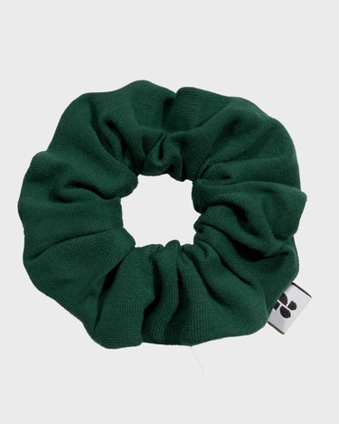 Sustainable green scrunchie made from recycled materials