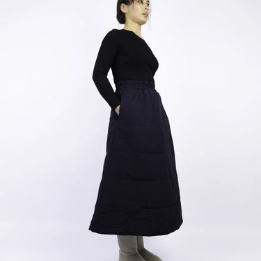 Navy blue vegan winter skirt made from recycled materials, featuring a long A-line silhouette and side pockets. - The New Orchard - Navy Blue / S